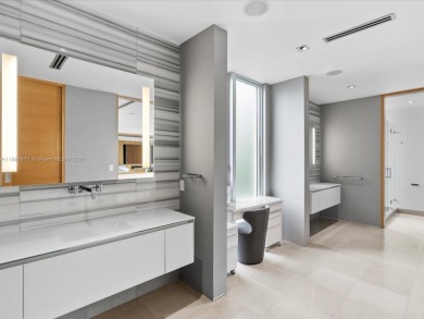 Set on prestigious Rio Vista Boulevard, this modern estate