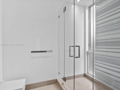 Set on prestigious Rio Vista Boulevard, this modern estate