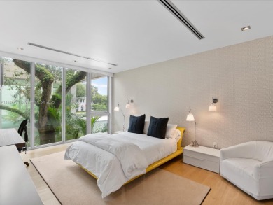 Set on prestigious Rio Vista Boulevard, this modern estate