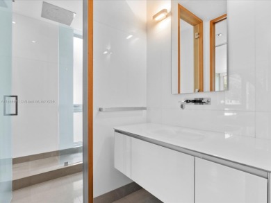 Set on prestigious Rio Vista Boulevard, this modern estate