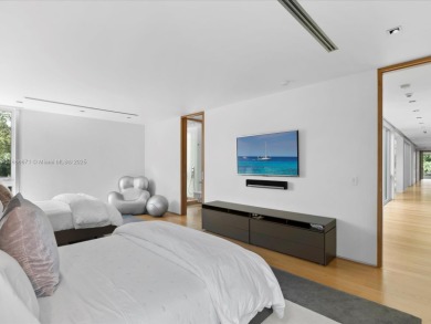 Set on prestigious Rio Vista Boulevard, this modern estate