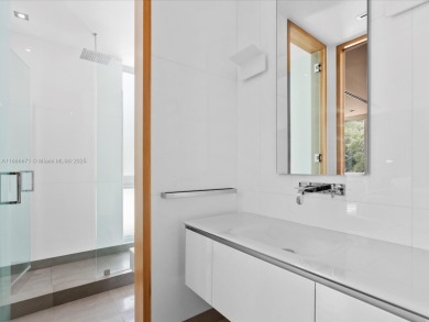 Set on prestigious Rio Vista Boulevard, this modern estate