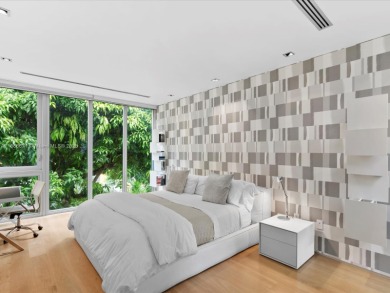 Set on prestigious Rio Vista Boulevard, this modern estate