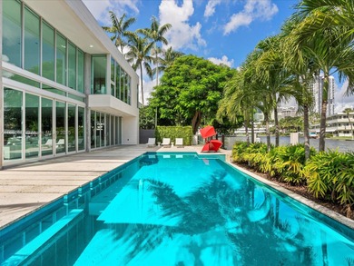 Set on prestigious Rio Vista Boulevard, this modern estate