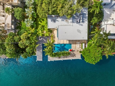 Set on prestigious Rio Vista Boulevard, this modern estate