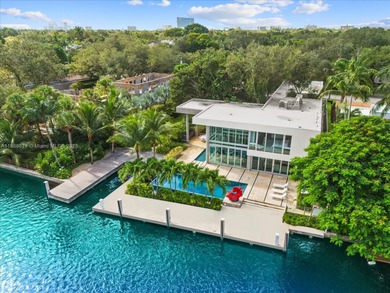 Set on prestigious Rio Vista Boulevard, this modern estate