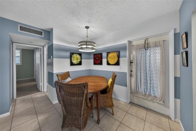 LOVELY, bright and cheerful, second floor garden view unit in