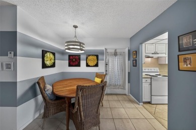 LOVELY, bright and cheerful, second floor garden view unit in