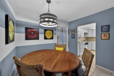 LOVELY, bright and cheerful, second floor garden view unit in
