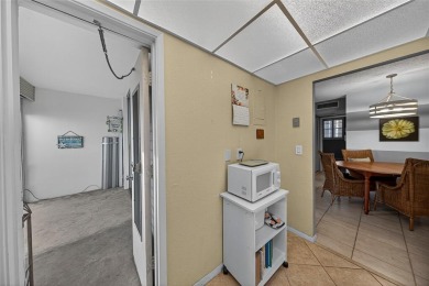 LOVELY, bright and cheerful, second floor garden view unit in