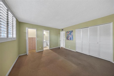 LOVELY, bright and cheerful, second floor garden view unit in