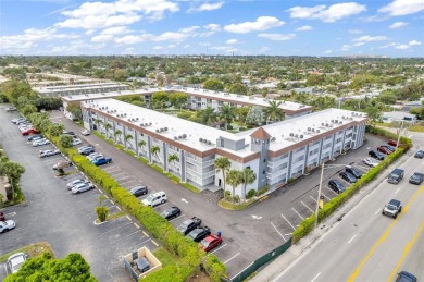 LOVELY, bright and cheerful, second floor garden view unit in