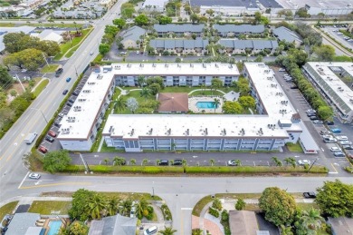 LOVELY, bright and cheerful, second floor garden view unit in