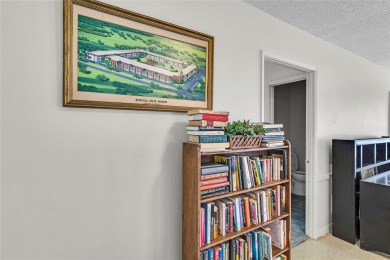 LOVELY, bright and cheerful, second floor garden view unit in