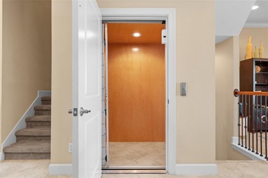 Waterfront Luxury Townhome with Private Elevator in The Cove at