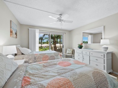 This inviting residence at the Islander Club of Longboat Key