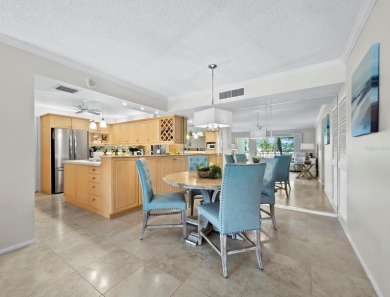 This inviting residence at the Islander Club of Longboat Key