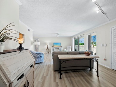 This inviting residence at the Islander Club of Longboat Key