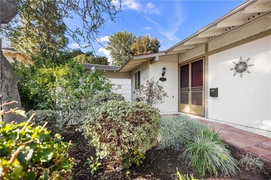 YOU WILL NOT WANT TO MISS SEEING THIS CHARMING VALENCIA COTTAGE