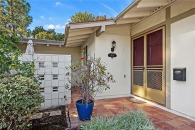 YOU WILL NOT WANT TO MISS SEEING THIS CHARMING VALENCIA COTTAGE