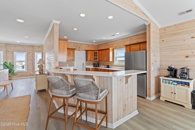 This absolutely gorgeous oceanfront home is a sight to behold