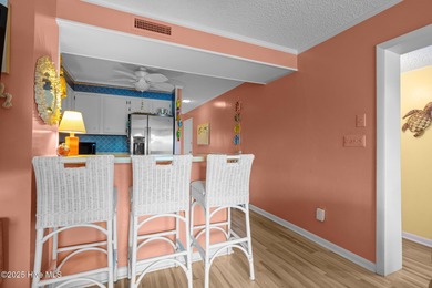 Enjoy island life with this oceanside 3 bedroom 2 1/2 bath condo