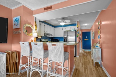 Enjoy island life with this oceanside 3 bedroom 2 1/2 bath condo