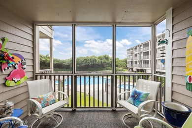 Enjoy island life with this oceanside 3 bedroom 2 1/2 bath condo