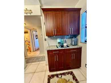 Updated 2/2 in Fairview at Pembroke Pines featuring tile floors