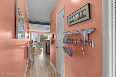 Enjoy island life with this oceanside 3 bedroom 2 1/2 bath condo