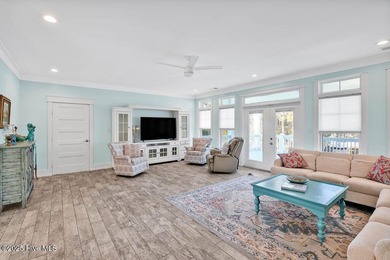 PRICED WELL BELOW APPRAISED VALUE! WELCOME TO COASTAL LUXURY AT