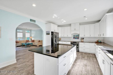 PRICED WELL BELOW APPRAISED VALUE! WELCOME TO COASTAL LUXURY AT