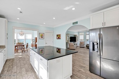 PRICED WELL BELOW APPRAISED VALUE! WELCOME TO COASTAL LUXURY AT