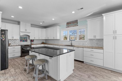 PRICED WELL BELOW APPRAISED VALUE! WELCOME TO COASTAL LUXURY AT