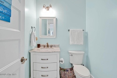 PRICED WELL BELOW APPRAISED VALUE! WELCOME TO COASTAL LUXURY AT