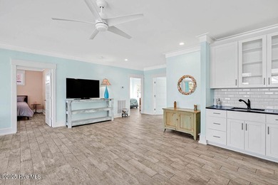 PRICED WELL BELOW APPRAISED VALUE! WELCOME TO COASTAL LUXURY AT