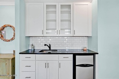 PRICED WELL BELOW APPRAISED VALUE! WELCOME TO COASTAL LUXURY AT