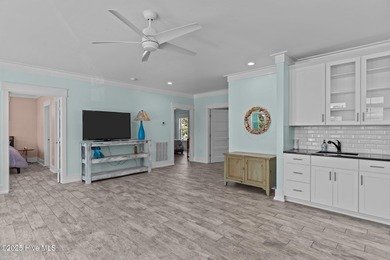 PRICED WELL BELOW APPRAISED VALUE! WELCOME TO COASTAL LUXURY AT