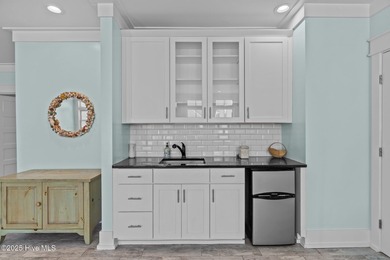 PRICED WELL BELOW APPRAISED VALUE! WELCOME TO COASTAL LUXURY AT