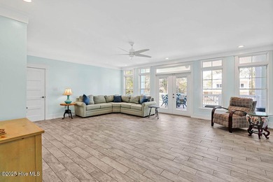 PRICED WELL BELOW APPRAISED VALUE! WELCOME TO COASTAL LUXURY AT