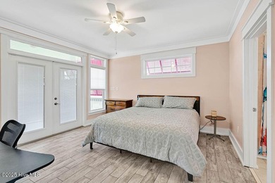 PRICED WELL BELOW APPRAISED VALUE! WELCOME TO COASTAL LUXURY AT