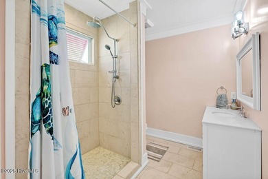 PRICED WELL BELOW APPRAISED VALUE! WELCOME TO COASTAL LUXURY AT