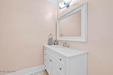 PRICED WELL BELOW APPRAISED VALUE! WELCOME TO COASTAL LUXURY AT