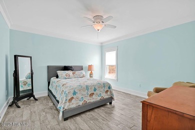 PRICED WELL BELOW APPRAISED VALUE! WELCOME TO COASTAL LUXURY AT