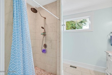 PRICED WELL BELOW APPRAISED VALUE! WELCOME TO COASTAL LUXURY AT