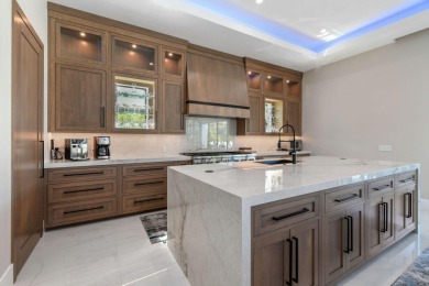 Experience the ultimate in coastal living with this custom-built