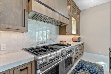 Experience the ultimate in coastal living with this custom-built