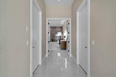 Experience the ultimate in coastal living with this custom-built