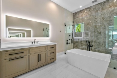 Experience the ultimate in coastal living with this custom-built