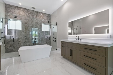 Experience the ultimate in coastal living with this custom-built